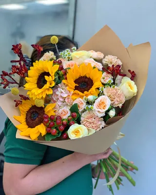 باقة مختلطة مع عباد الشمس وعد الحديقة