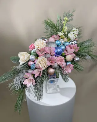 Christmas vase arrangement for table Snow-Kissed Grace delivery in Dubai