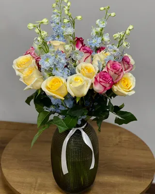 Vase arrangement Bright story delivery in Dubai