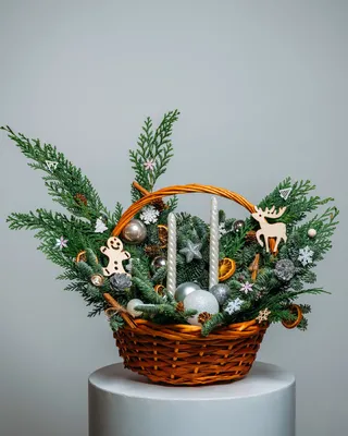 Basket Christmas arrangement Silver lights delivery in Dubai