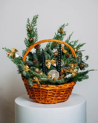 Basket Christmas arrangement Golden lights delivery in Dubai