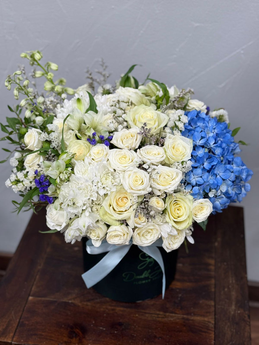 Blue touch box arrangement - DJ flowers