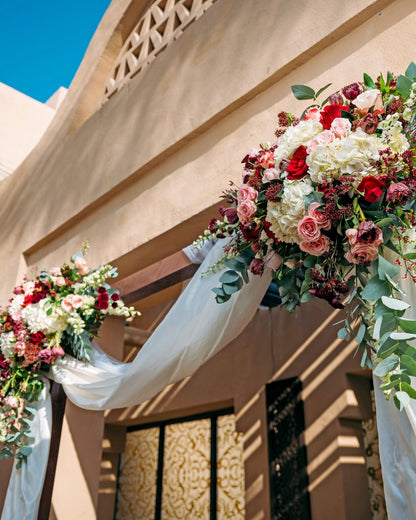 Burdundy touch wedding arch - DJ flowers