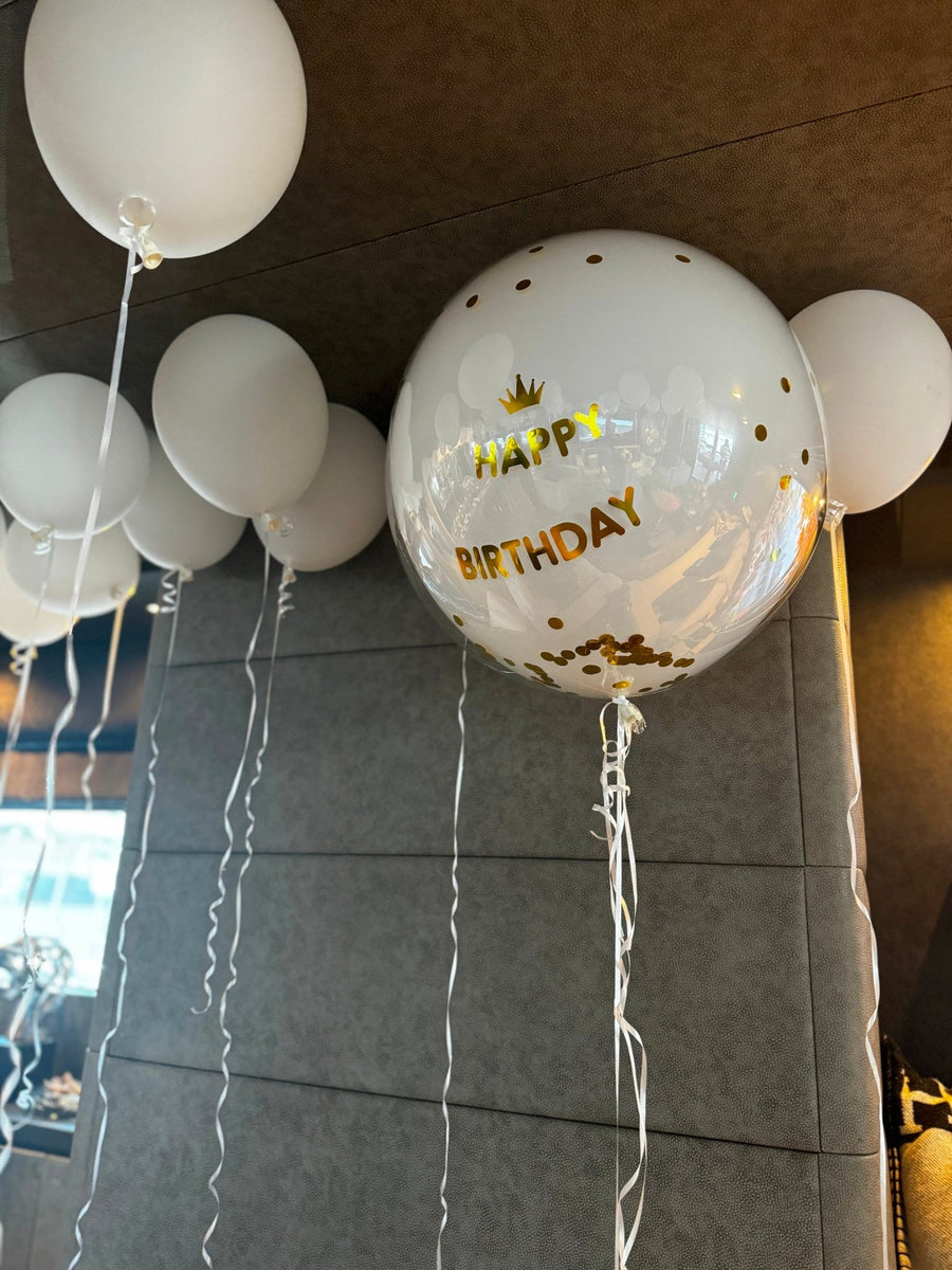 Celebration Atmosphere by Design: helium balloon decoration - DJ flowers