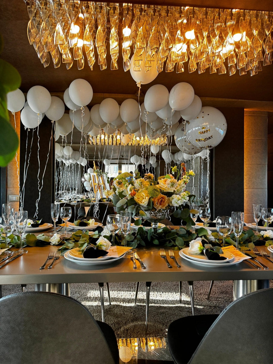 Celebration Atmosphere by Design: helium balloon decoration - DJ flowers