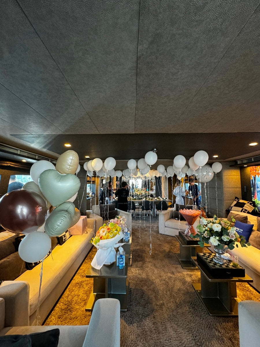 Celebration Atmosphere by Design: helium balloon decoration - DJ flowers