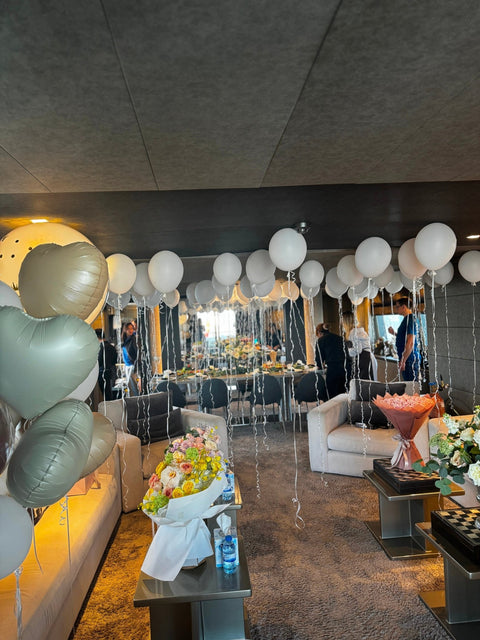 Celebration Atmosphere by Design: helium balloon decoration - DJ flowers